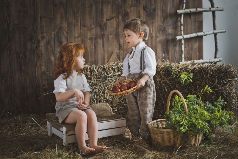Children play with Easter eggs in the barn 6072.